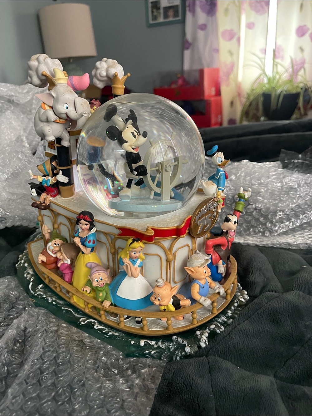 Disney store 75th anniversary steamboat ride snow globe